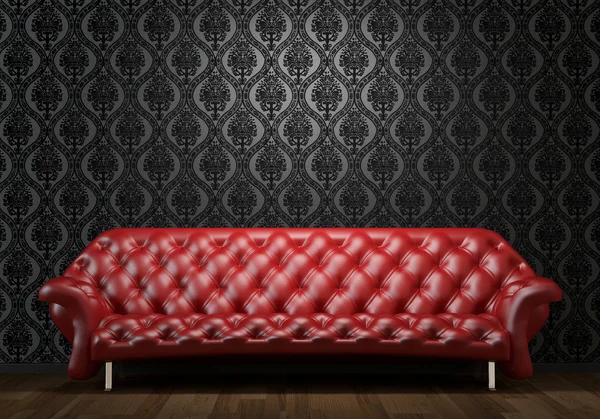 Czerwona skórzana kanapa na ścianie czarny — Zdjęcie stockowe
