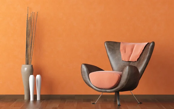 Moderne Ledercouch an orangefarbener Wand — Stockfoto
