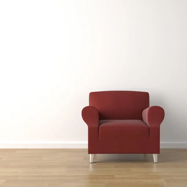 Red couch on white wall