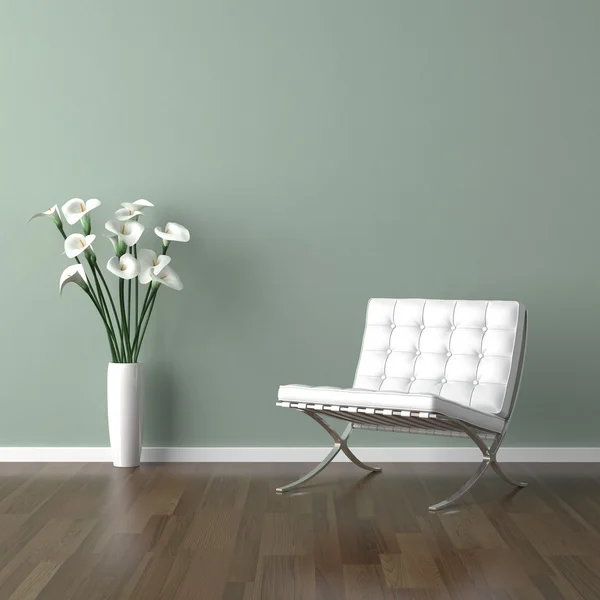 Белый барселонский стул на зеленом Стоковое Изображение