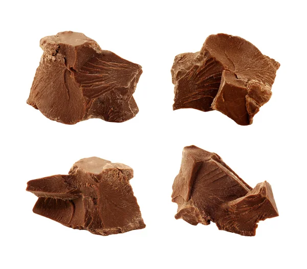 Cioccolato pezzi isolati su bianco — Foto Stock