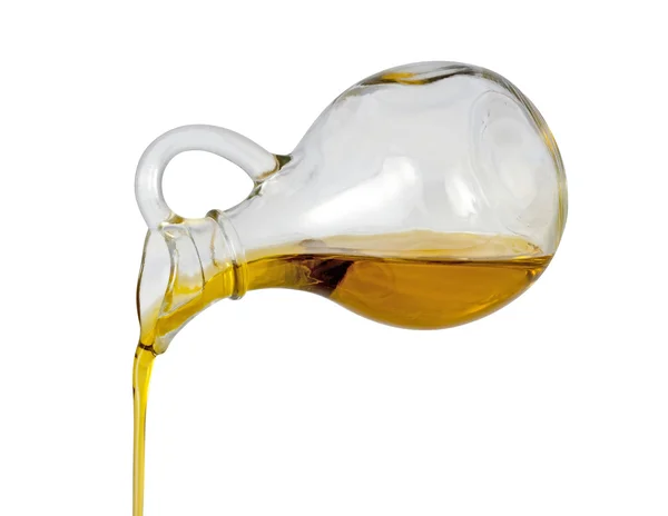 Olivenöl mit einem Schneideweg gießen — Stockfoto