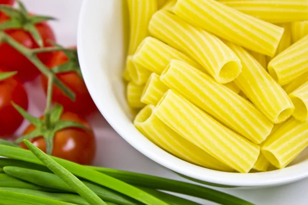 stock image Raw pasta in a bowl