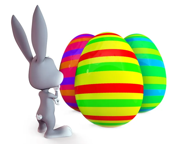 Conejo de Pascua observando grandes huevos coloridos —  Fotos de Stock