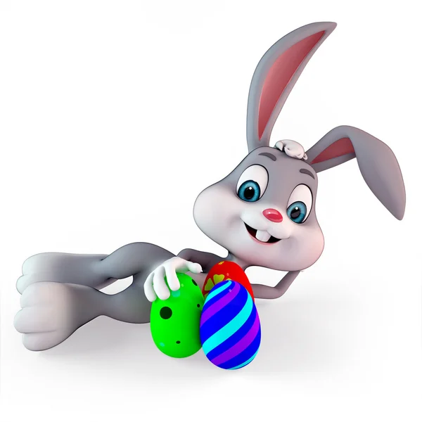 Uśmiechający się króliczek z kolorowymi jajkami — Zdjęcie stockowe