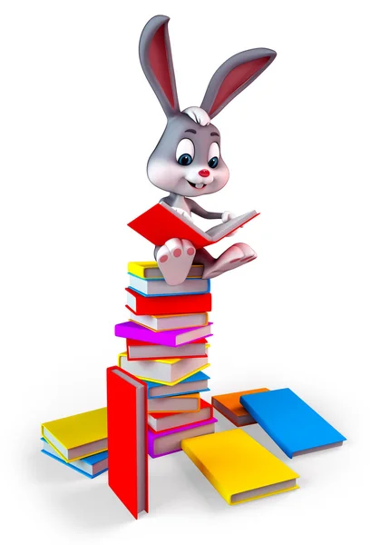 Happy Bunny sitting on a large books Stack — Stock Photo, Image