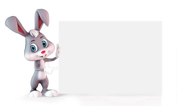 Happy bunny wijst naar teken — Stockfoto
