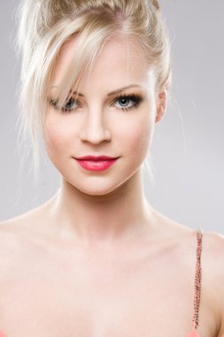 Attractive young blond woman. clipart