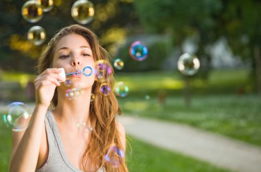 As easy as blowing bubbles. clipart