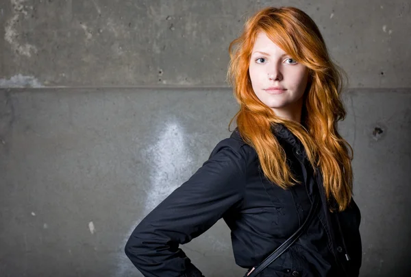 stock image Portrait of a beautiful fashinable young redhead.