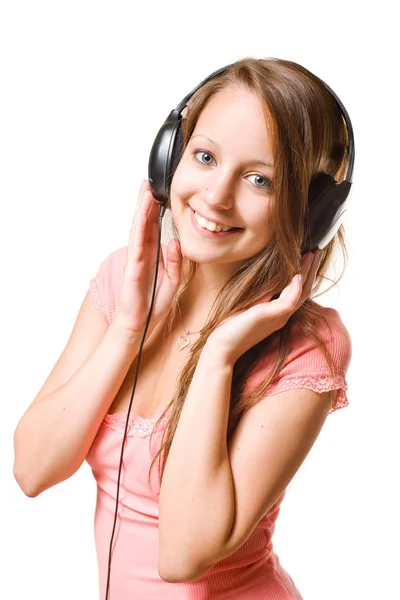 Zoete brunette met het luisteren naar muziek — Stockfoto