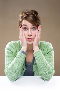 Shocked young woman. clipart