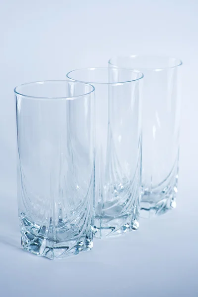 stock image Decorative drinking glasses shot in cool blue filtering.