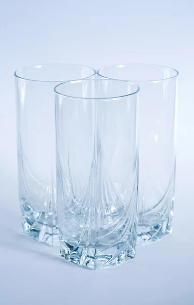 stock image Decorative drinking glasses shot in cool blue filtering.