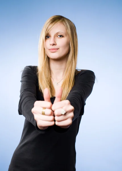 Pretty young blond showing big thumbs up. — Stock Photo, Image