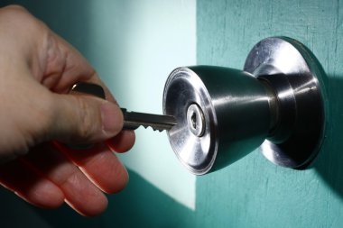 Unlocking a Door clipart