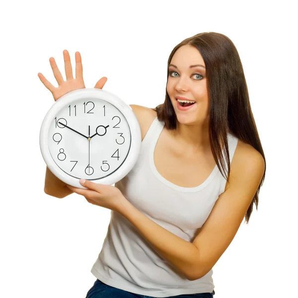 The girl with clock in hands is happy — Stock Photo, Image