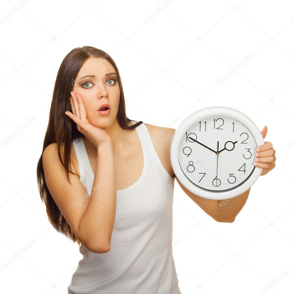 The young woman with clock is upset and surprised