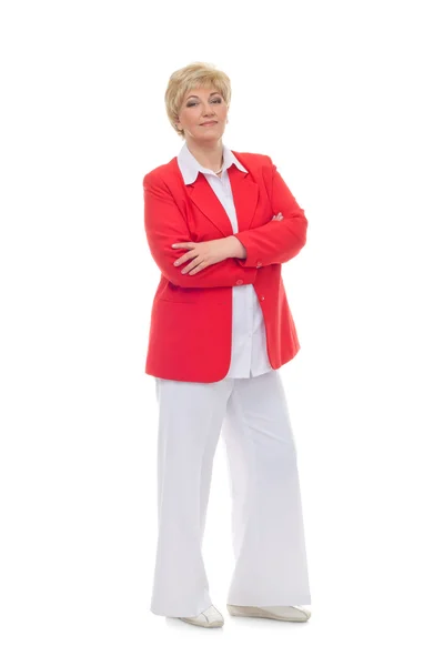 Portrait of a smiling adult woman in a red jacket standing with — Stock Photo, Image