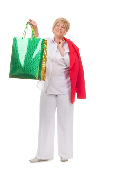 Portrait of a smiling adult woman with shopping bags — Stock Photo, Image