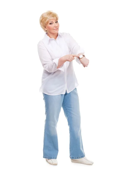 Senior woman shows the watch — Stock Photo, Image
