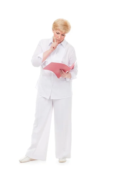 The woman looks at a folder — Stock Photo, Image