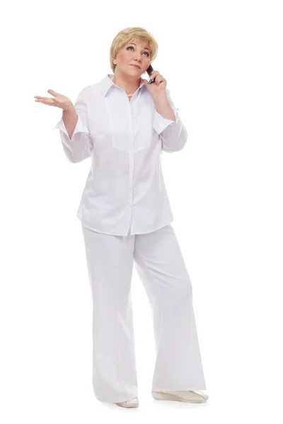 The woman is talking on the phone — Stock Photo, Image