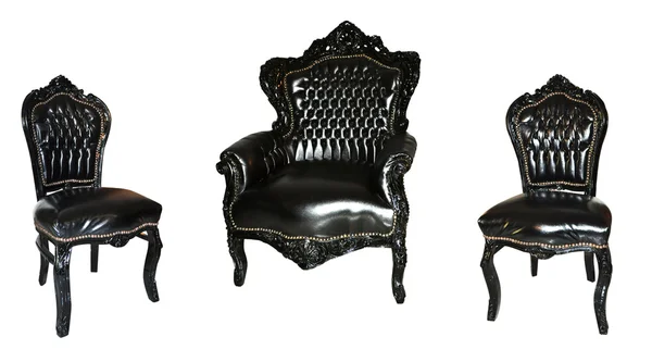 Set zwart lederen fauteuils geïsoleerd op witte achtergrond — Stockfoto