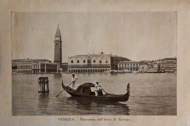 ITALY - CIRCA 1910: A picture printed in Italy shows image of Venice panoramic view with gondola boat, Vintage postcards 