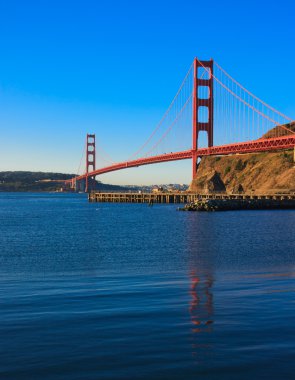 Golden Gate Bridge just after sunrise clipart