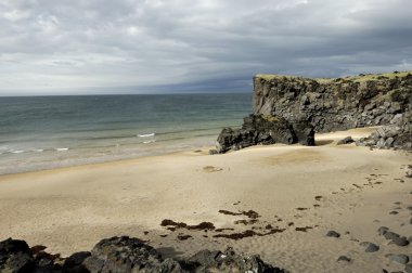 Golden beach at Skardsvik, Iceland clipart