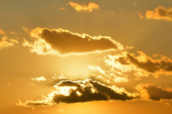 Stock image Sunset and golden clouds.