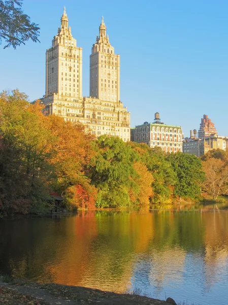 stock image Beautiful buildings near park with pound