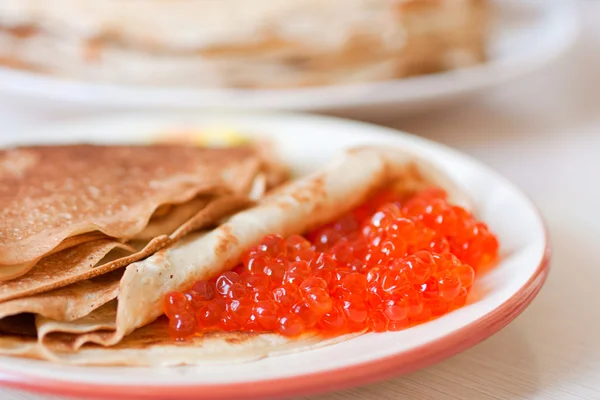 stock image Pancakes with caviar traditionaly served for shrovetide.