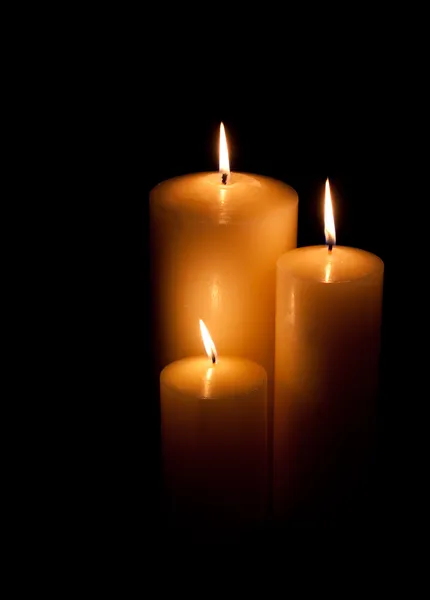 Tři svíčky hořící — Stock fotografie