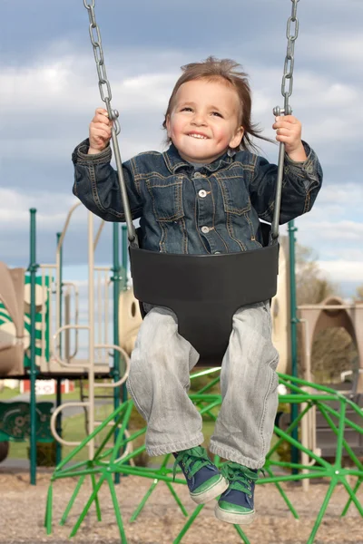 Young Boy Swinging — Stock Photo, Image