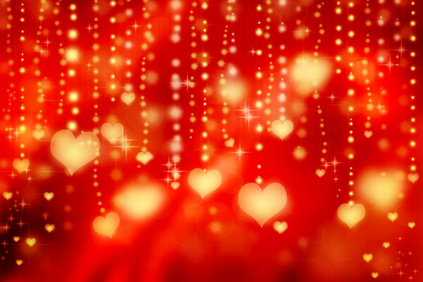 Golden shiny hearts on red background