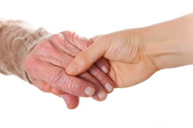 Senior and Young Women Holding Hands clipart