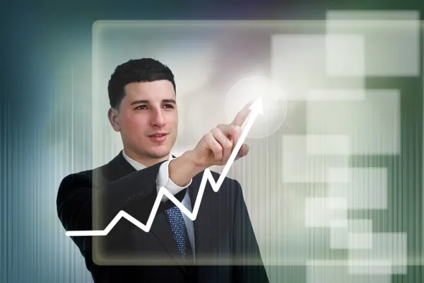 Empresário poiting ao crescimento em um gráfico — Fotografia de Stock