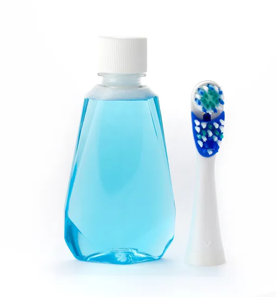 Mouthwash and toothbrush — Stockfoto