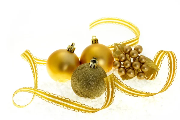 Enfeites de Natal dourado — Fotografia de Stock