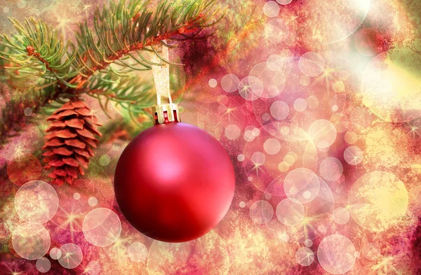 Červené vánoční ozdoba nad abstraktní světla pozadí — Stock fotografie