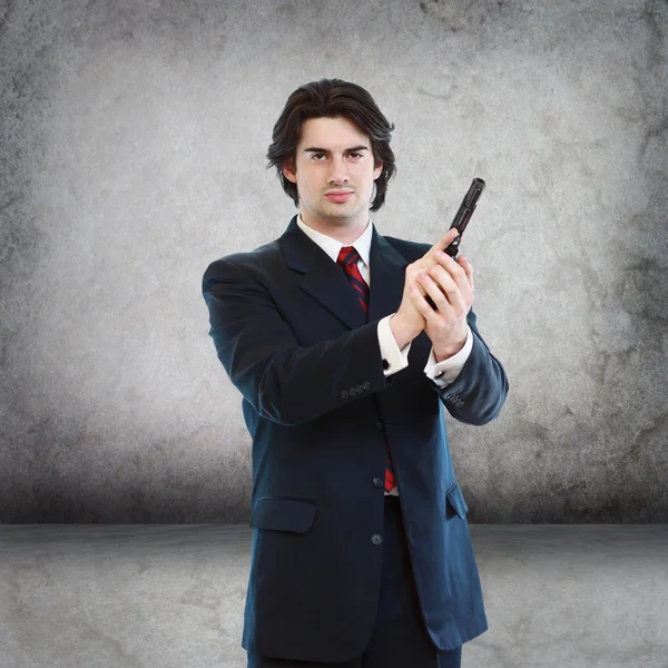 Handsome Man with a Hand Gun — Stock Photo, Image