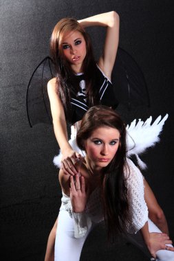 Demon and angel clipart