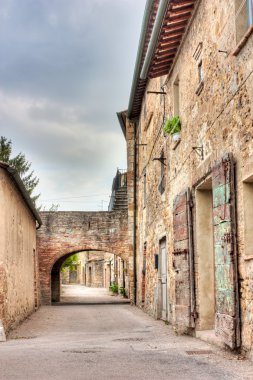 Old alley in Tuscany clipart