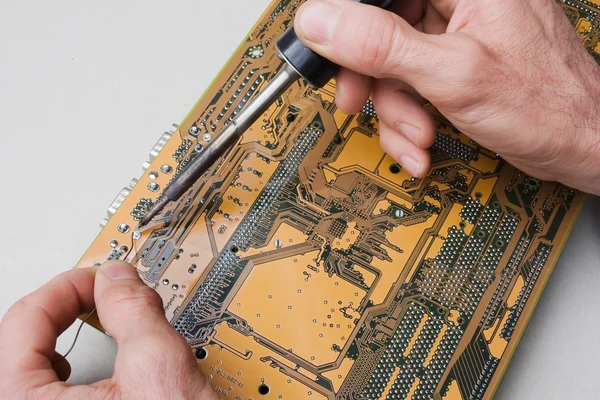 Repair of circuit board — Stock Photo, Image