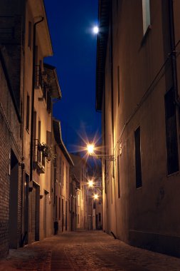 Dark alley in the old town clipart