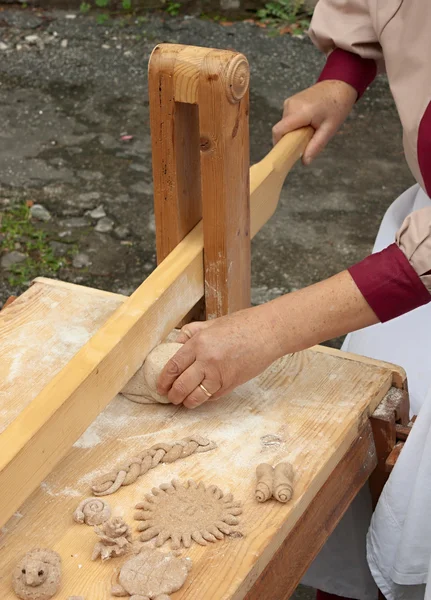 Woman making the dough for bread — Stok fotoğraf