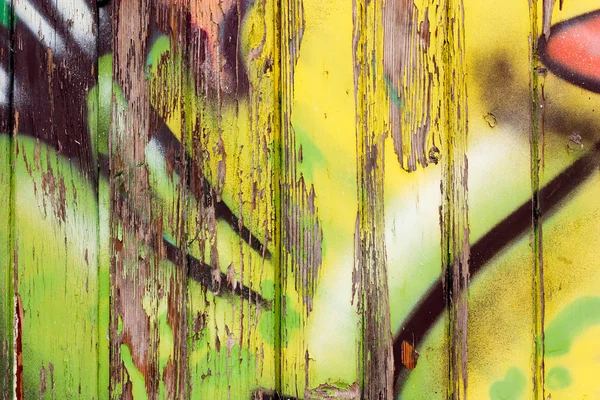 Dřevěná stěna s graffiti — Stock fotografie