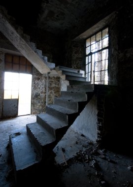 Abandoned room with staircase clipart